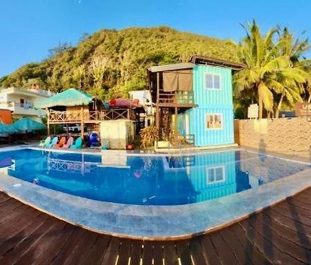 Aura Marina Sands Beach Resort Baler Bagian luar foto