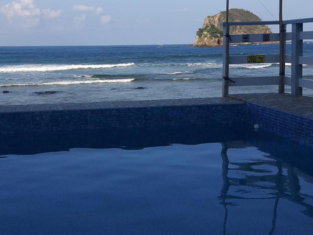 Aura Marina Sands Beach Resort Baler Bagian luar foto