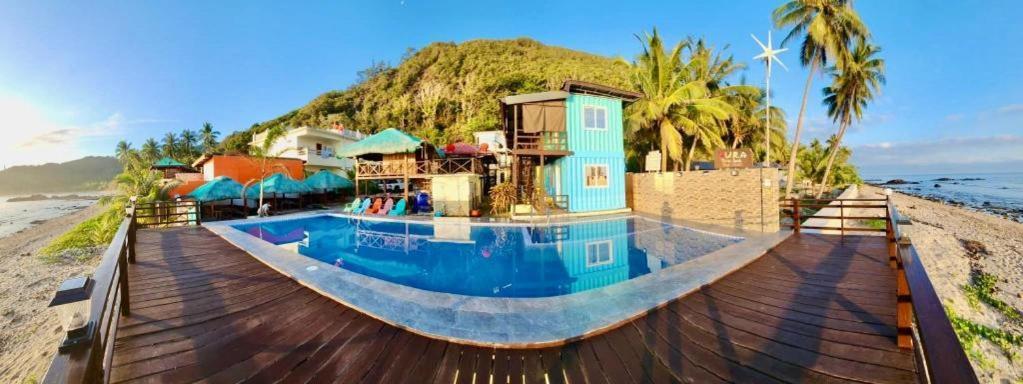 Aura Marina Sands Beach Resort Baler Bagian luar foto