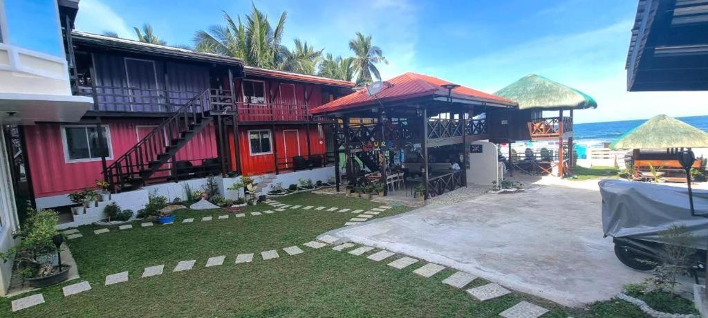 Aura Marina Sands Beach Resort Baler Bagian luar foto