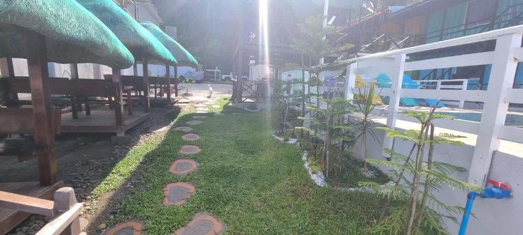 Aura Marina Sands Beach Resort Baler Bagian luar foto