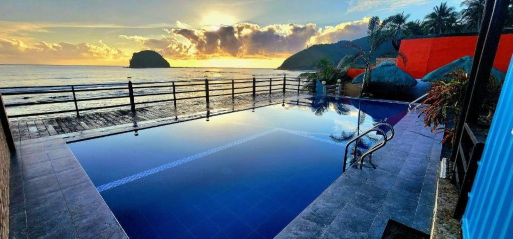 Aura Marina Sands Beach Resort Baler Bagian luar foto