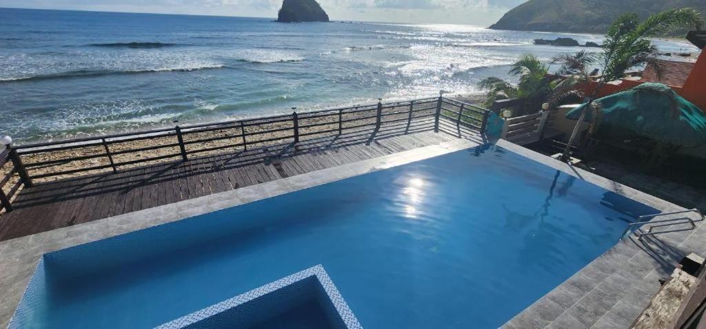 Aura Marina Sands Beach Resort Baler Bagian luar foto