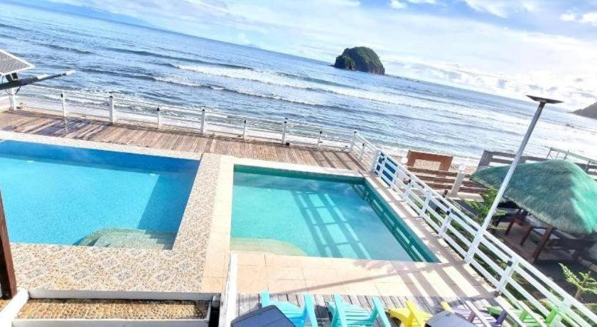 Aura Marina Sands Beach Resort Baler Bagian luar foto